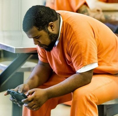 inmate using endovo tablet - John Timpone